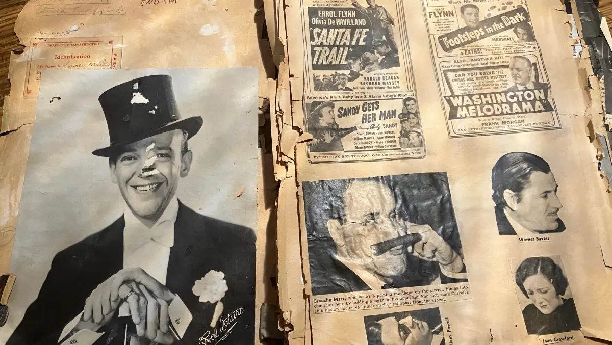 A photograph from an old scrapbook that catalogs movies in South Bend