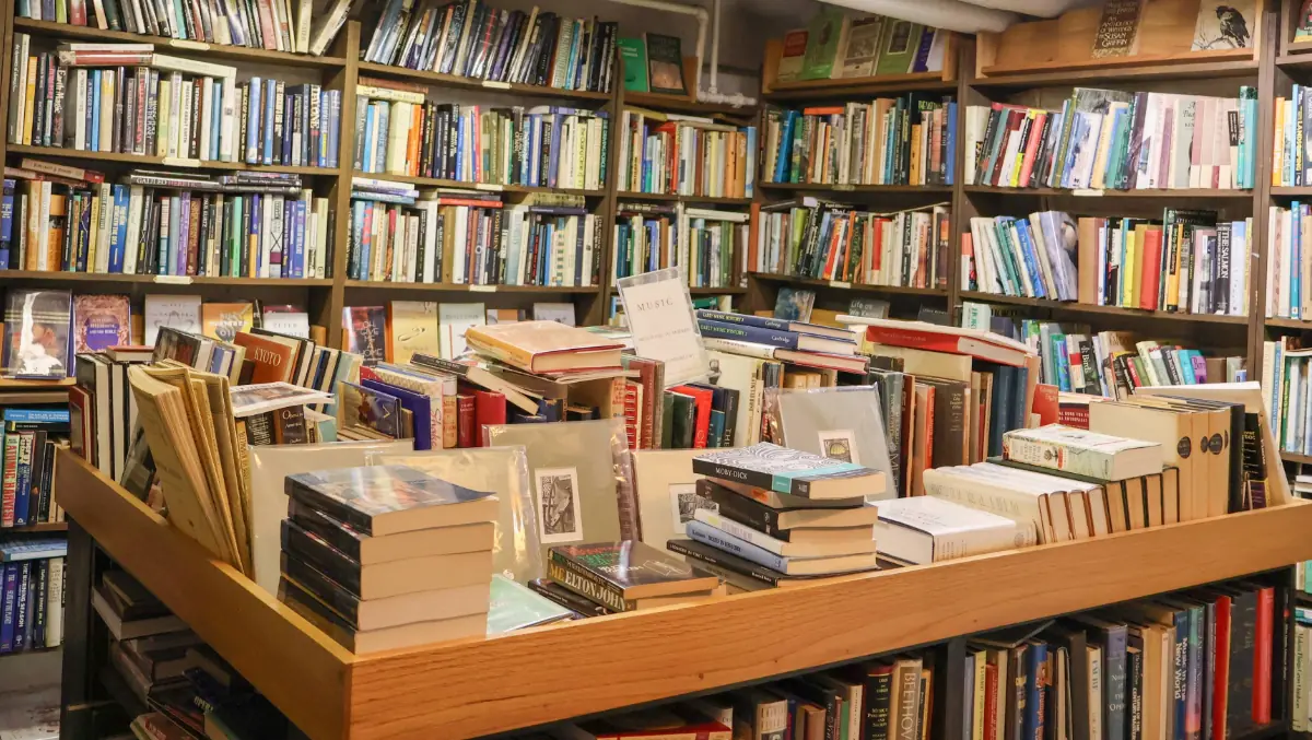 Piles and shelves of books at Erasmus Books in South Bend