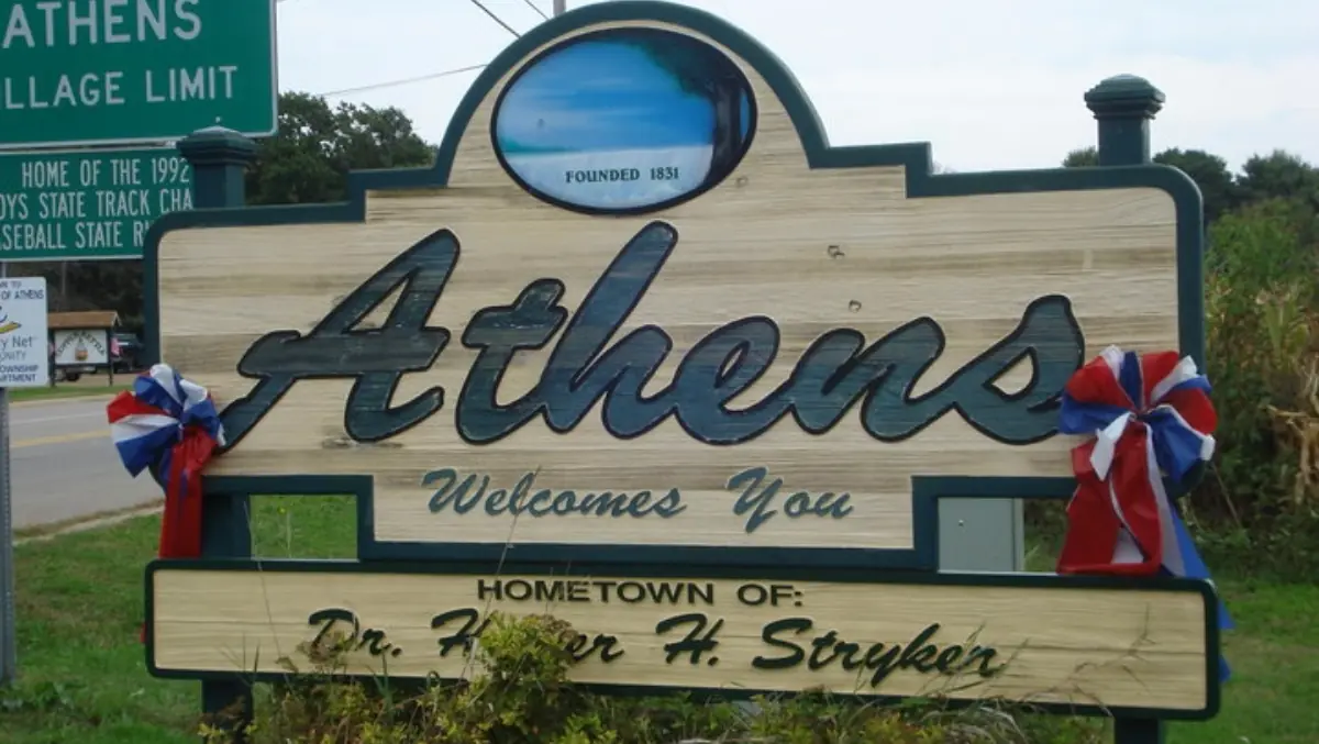 Photograph of the welcome sign in Athens, Michigan