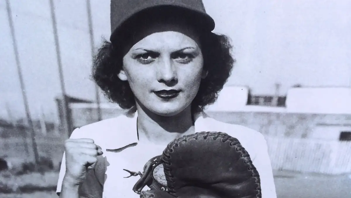 Photograph of Bonnie Baker wearing a catcher's mitt