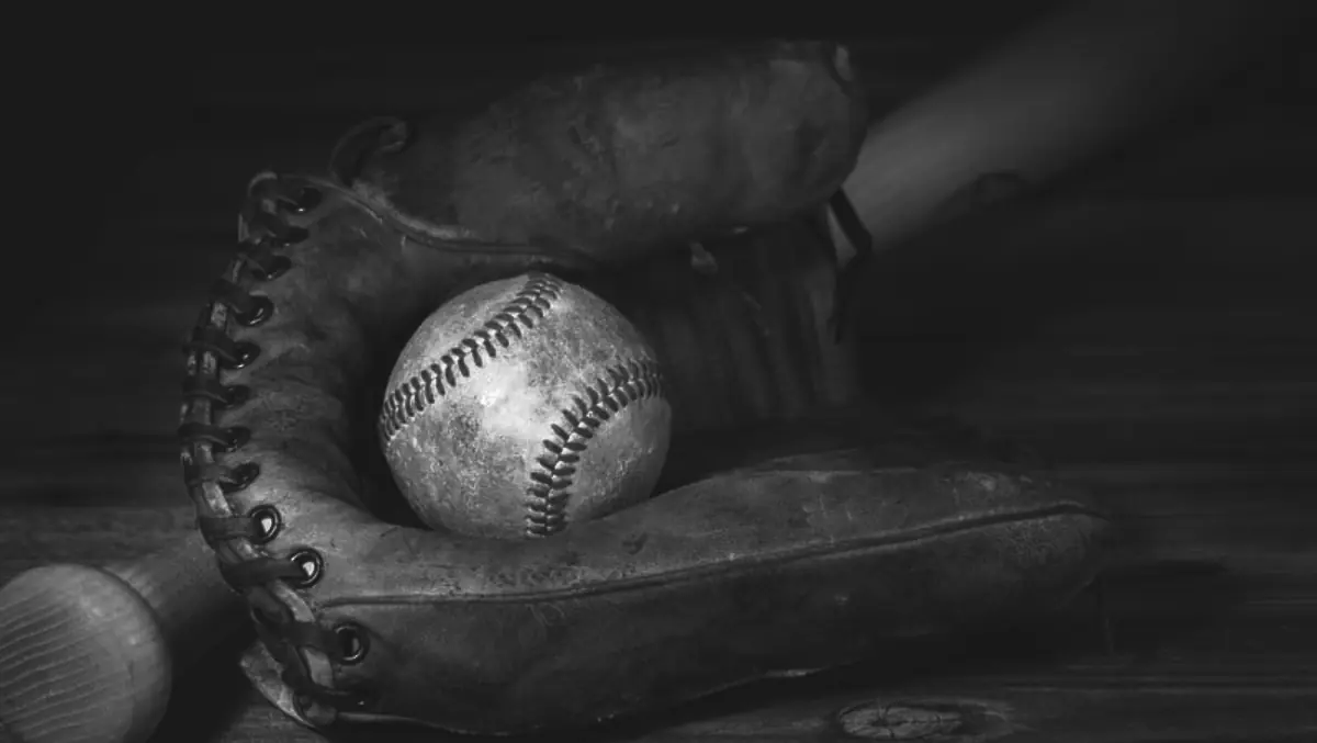 Photograph of an old baseball and baseball glove
