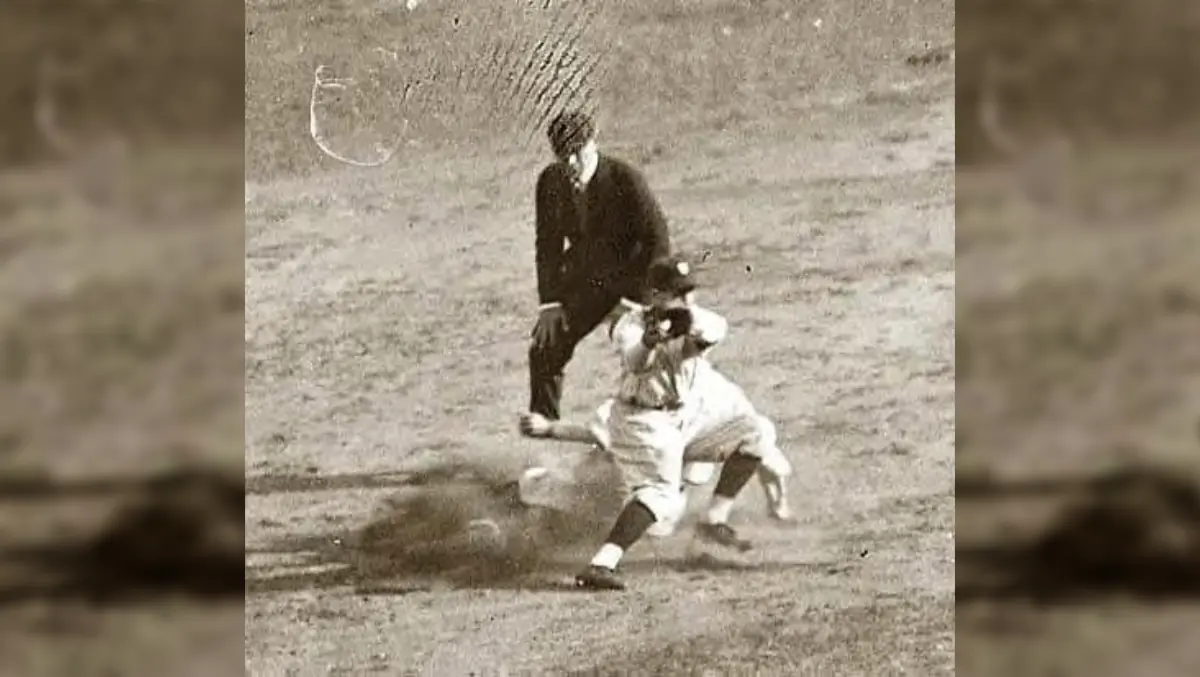 Old photo shows Max Carey stealing a base during the 1925 World Series