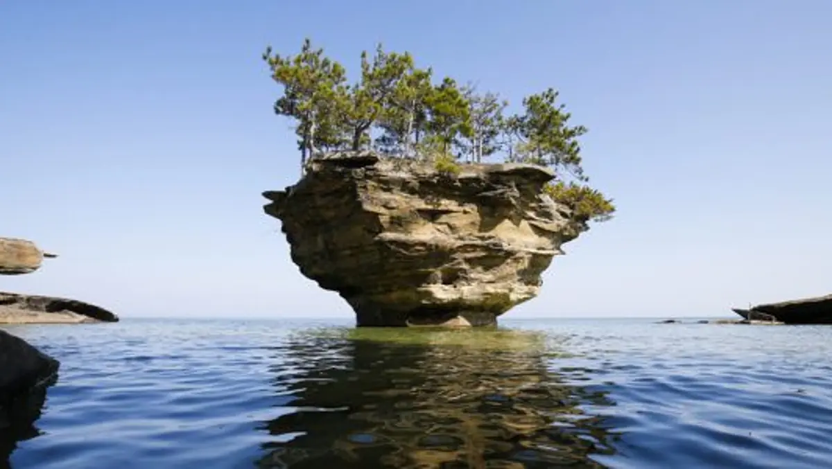 A photograph of Turnip Rock near Port Austin, Michigan