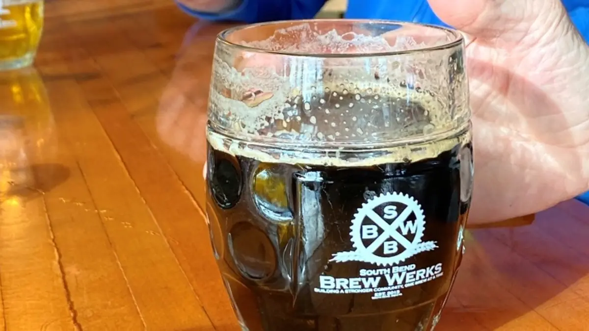 Kirby Sprouls enjoy a Colonel Eddy Oatmeal Stout at South Bend Brew Werks.