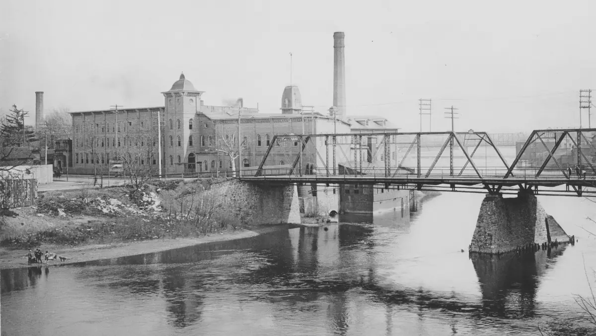 Historic photograph shows the South Bend Woolen Mill factory in South Bend, Indiana.