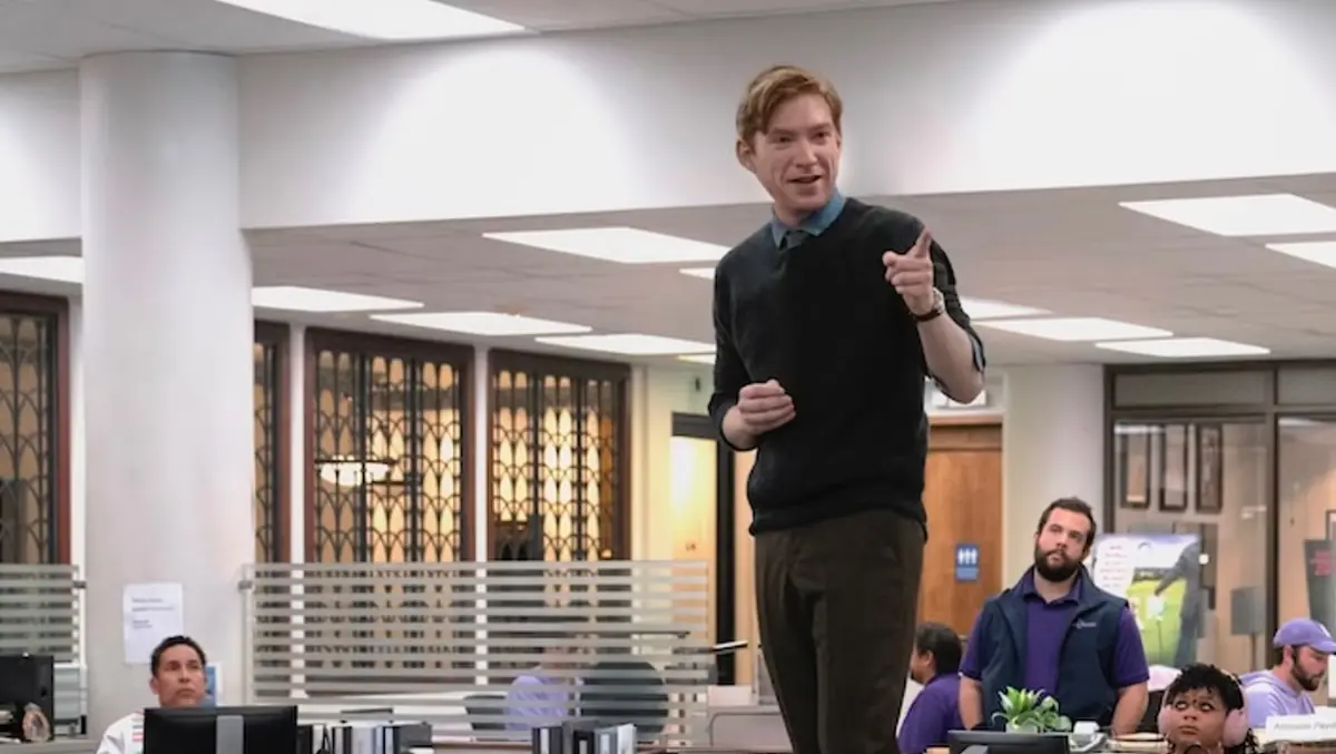 Ned Sampson, played by Domhnall Gleeson, gives a pep talk to the staff of the Toledo Truth Teller in Peacock's show 'The Paper.'
